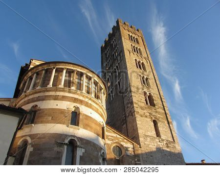 Basilica Of San Frediano ( Saint Fridianus ) In Lucca. View From The Back Of The Basilica In The Squ