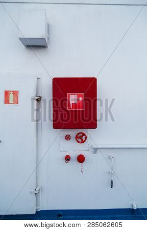 Fire Fighting Equipment, Water Hose, Connections And Valves For Water Ready For Use At The Bulkhead 