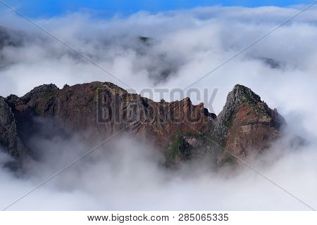 Rock Formation In Dense Clouds On Pico Do Arieiro On Portuguese Island Of Madeira