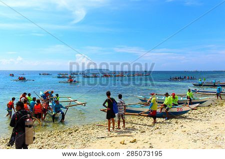 Oslob, Cebu, Philippines - October 2, 2018: Tourists On The Boats In The Middle Of A Calm Sea Waitin