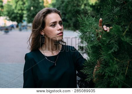 Beautiful Young Girl In The Park On A Summer Evening.
