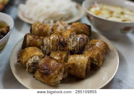 Traditional Vietnamese Fried Springrolls On A Plate. Asian Food Background. Selective Focus, Shallow