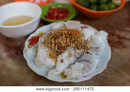 Traditional Vietnamese Banh Coun Street Food Meal Of Rice Stuffed Pancakes Decorated With Shallot. A
