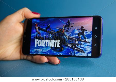 Tula, Russia - January 27, 2019 - Fortnite Video Game Screen With Character And Console Controller. 