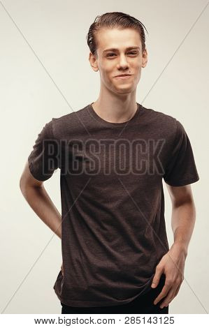 Isolated Studio Portrait Handsome Caucasian Male Model. Laughing At Joke, He Couldnt Stop Laughing. 