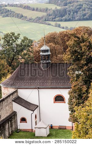 Kaple Sv. Ondreje Chapel On Hukvaldy Castle Complex In Czech Republic With Colorful Trees Around Dur
