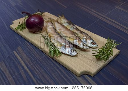 Dried Chehon Fish On A Wooden Board