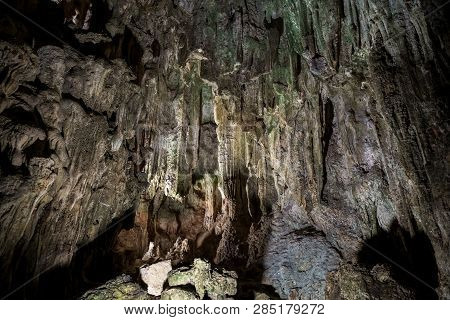 Cave Deep Dark Inside. Underground Of Stone Rock Mountain. Ha Long Vietnam Nature Background