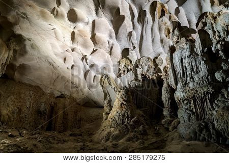 Cave Deep Dark Inside. Underground Of Stone Rock Mountain. Ha Long Vietnam Nature Background