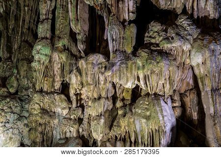 Cave Deep Dark Inside. Underground Of Stone Rock Mountain. Ha Long Vietnam Nature Background