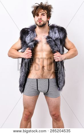 Sexy Sleepy Rich Macho Tousled Hair Fur Vest On White Background. Guy Attractive Fashion Model Posin