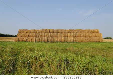 Country Landscape, Large Hayrick On The Meadow, Sunny Summer Day