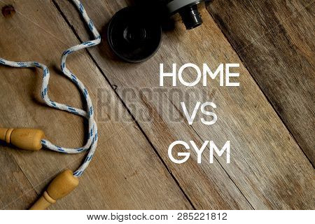 Health And Fitness Concept. Top View Of Skipping Rope And Water Bottle On Wooden Background Written 