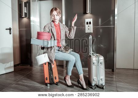 Girlfriend Wearing High Heels Waiting For Her Man Near Elevator