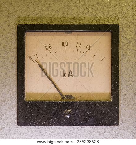 Old Analog Instrument - Ampere Meter Isolated On Grey Background.