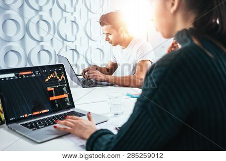 Сolleagues Analyze Digital Reports On Screen Monitor And Preparing Financial Report For Investors. T