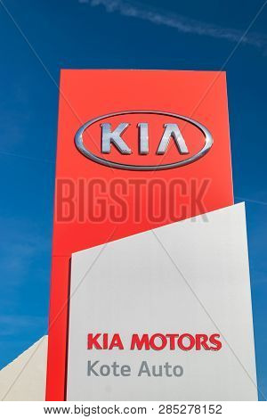 Roncq,france-february 20,2019: Kia Brand Logo On A Blue Sky Background.kia Motors Is A South Korean 