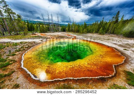  Morning glory pool from above. Stormy weather. Yellowstone National Park, Wyoming, USA