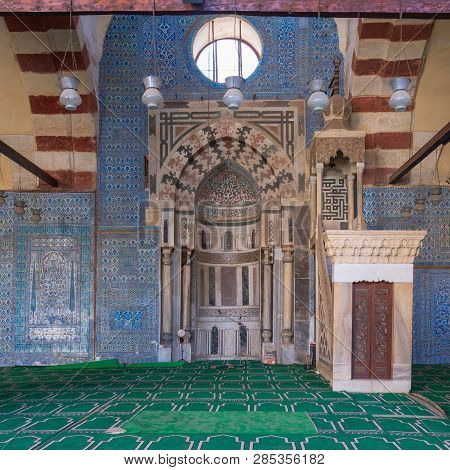 Cairo, Egypt - January 8 2019: Blue, Iznik Ceramic Tiles Wall With Engraved Mihrab (niche) And Decor