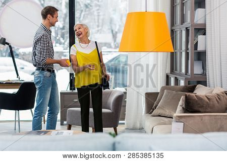 Elegant Fancy Elderly Woman Selecting New Couch With Good-appealing Son