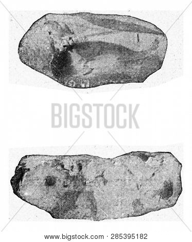 Flint burst under rotary pressure, Flint burst by pressure in the moraine, vintage engraved illustration. From the Universe and Humanity, 1910.