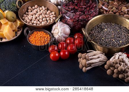 Still Life Food Set  On Dark Background. Concept Healthy Eating. Broccoli, Beans, Lentils, Nut, Chee