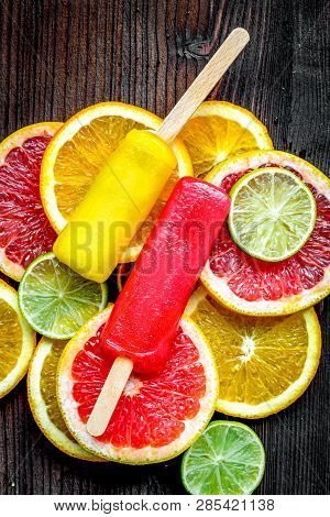 Orange Icecream With Fruits On Table Background Top View