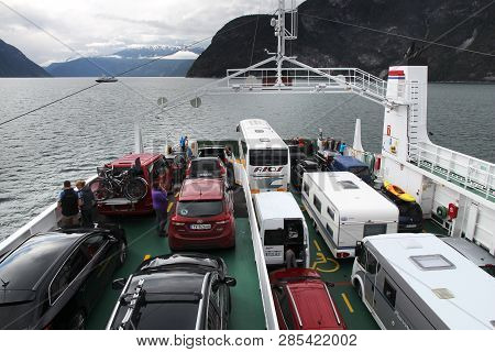 Sognefjord, Norway - July 18, 2015: People Ride The Ferry Ship Across Sognefjord, Norway. Public Tra