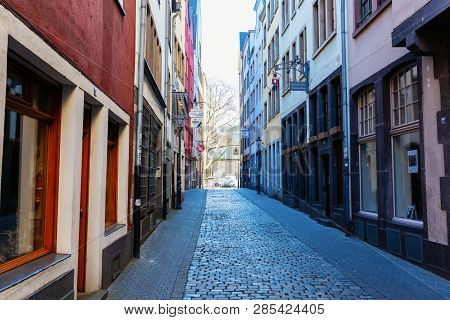 Narrow Alley In The Historic Old Town Of Cologne, Germany