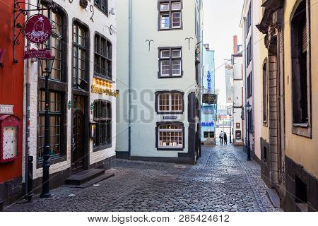Narrow Alley In The Historic Old Town Of Cologne, Germany
