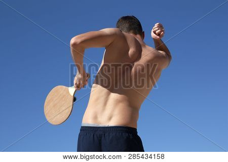 The Guy Plays Matkot On The Beach