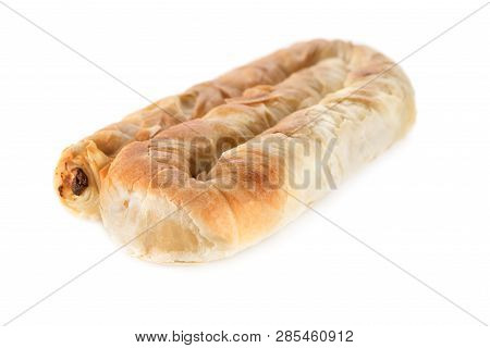 Placinta Cake Filled With A Soft Cheese. Isolated On A White Background.