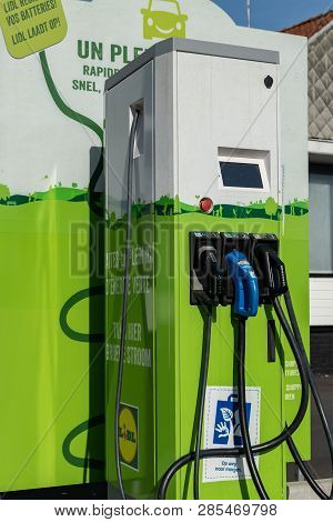 Mouscron,belgium-february 17,2019: Free Distributor For Charging Electric Car Current In Lidl Superm