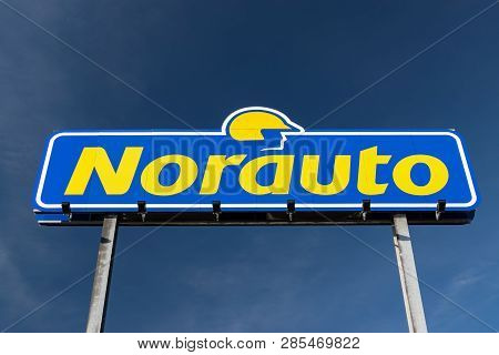 Roncq,france-february 20,2019: Norauto Brand Logo On A Blue Sky Background.norauto Is A French Based