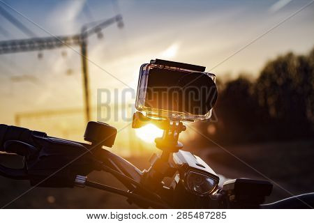 Action Camera On The Bike, Against The Backdrop Of The Sunset