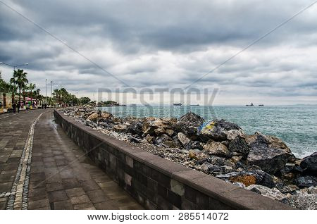 Dramatic Landscape On A Storm Sea In Iskenderun, Turkey With Stone Pier