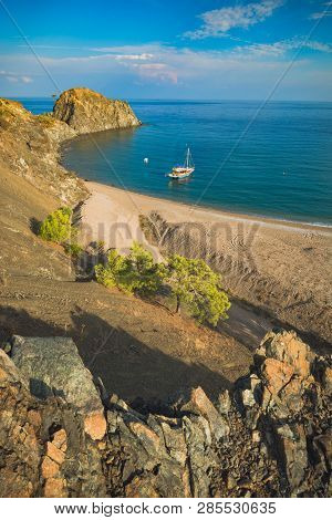 View From The Cliff To Cirali Beach And Olimpos Mountain In A Sunset Light. Kemer, Antalya, Mediterr