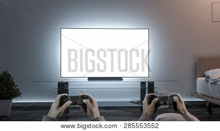 Playing Videogame With Joystick Near Blank White Tv Screen Mockup, 3d Rendering. Empty Lcd Monitor A