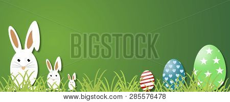 Easter Concept. Green Grass, Easter Rabbits Eggs And Web Banner Background