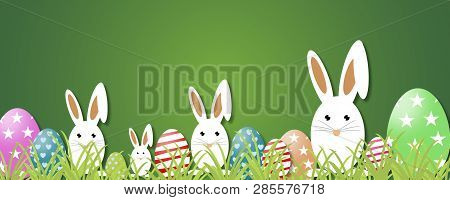 Easter Concept. Green Grass, Easter Rabbits Eggs And Web Banner Background