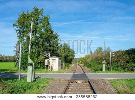Railroad Crossing In Rural Area
Location: Germany, North Rhine-westphalia