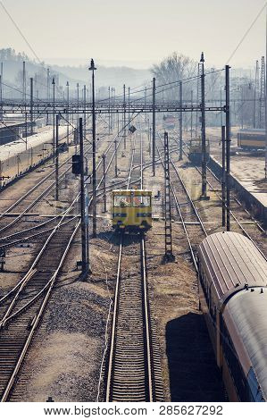 Complicated Railway Network With Power Lines And Freight Wagon For Track Maintanance, Sunny Day, Smi