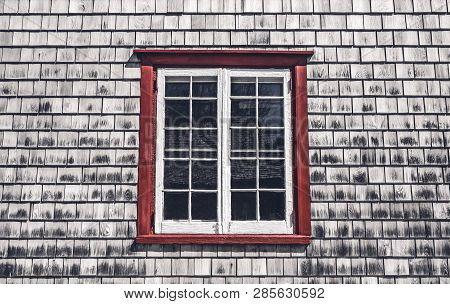 Window Of A Traditional Country House. Old Cabin With Wooden Tiled Walls. Quebec, Canada.