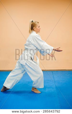 Young Girl Dressed In Hakama Practicing Aikido