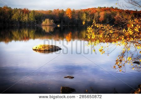 Reflections Of The Colorful Autumn On The Water At Burr Pond Torrington, Connecticut.