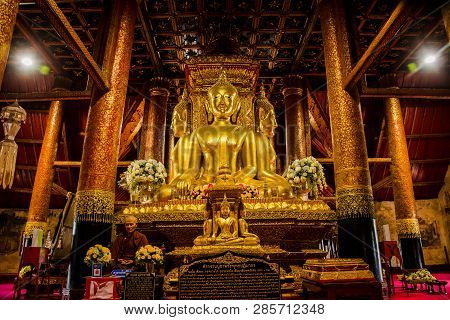 Big Golden Buddha Statue In Midst Of Temple’s Hall