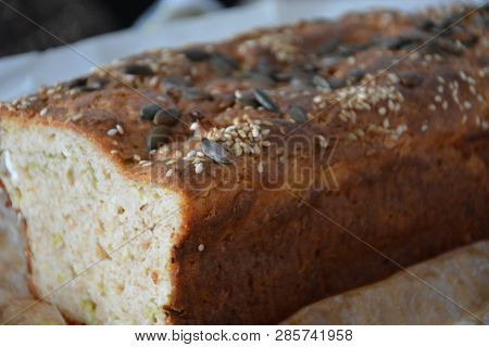 Bread Of Spelled Flour With Pumpkin And Sesame Seeds. Inside Is A Kale And A Cheese - Feta. Homemade