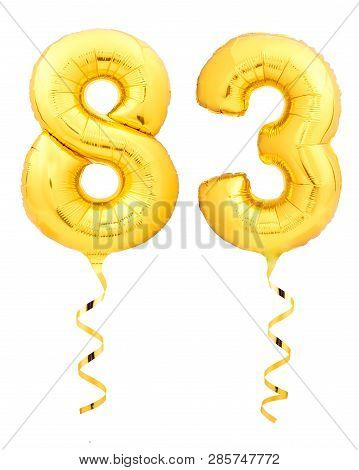 Golden Number Eighty Three 83 Made Of Inflatable Balloon With Ribbon On White