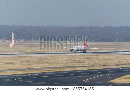 Dusseldorf, Nrw, Germany - March 18, 2015: Up, Airplane Dusseldorf. View Of The Tarmac. Large Passen