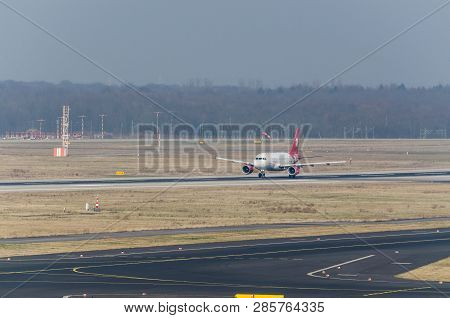 Duesseldorf, Nrw, Germany - March 18, 2015: Up, Airplane Dusseldorf. View Of The Tarmac. Large Passe